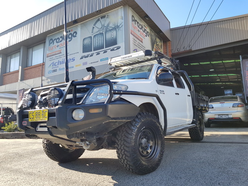 Toyota Hilux fitted up with 16'' King Terra Steel Wheels & 265/75r16 Nitto Trail Grappler Mud Tyres image