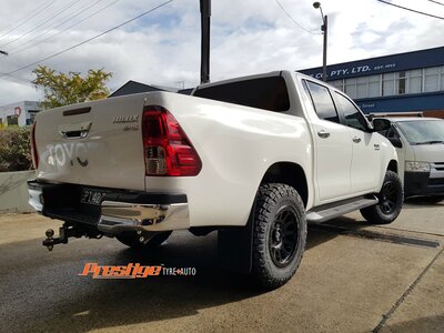 Toyota Hilux 2018 fitted with 17" Black Fuel Vectors & 265/70r17 Nitto Ridge Grappler Tyres image